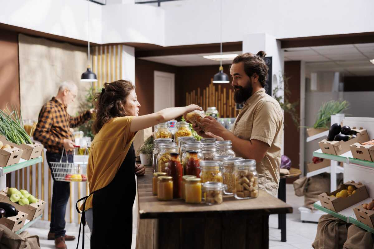 Woman showcasing food in local venue